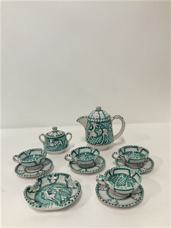 Ceramiche Giacomini
Servizio in maiolica dipinta in verde e nero sottovetrina c