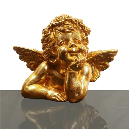 Putto dorato in posizione pensante