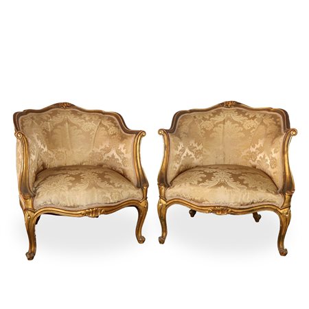 Coppia di poltrone di manifattura veneziana in legno dorato, scolpito e intagliato con decori floreali, Early 20° secolo