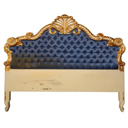 Testata da letto in legno dorato e laccato con tappezzeria capitonné, 20° secolo