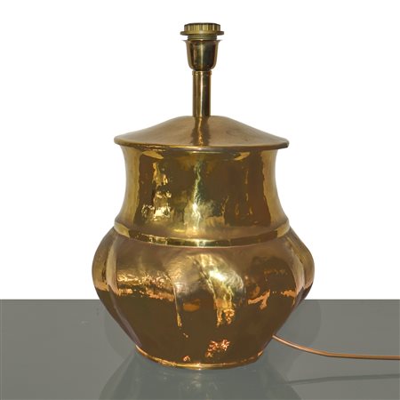 Lume con base in metallo dorato