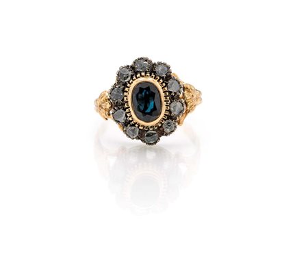  
Anello in oro, argento, diamanti e zaffiro 
 Misura 14