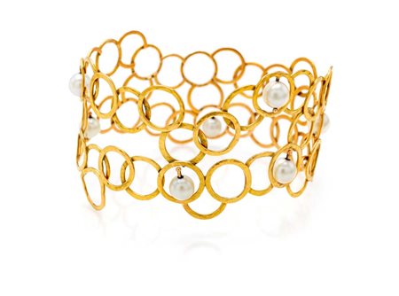 
Bracciale rigido in oro e perle 
 Veste polso 19
