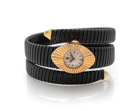  
Rolex precision orologio in oro con bracciale personalizzato tubogas in acciaio brunito. 
 Veste polso 18