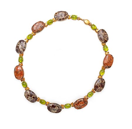  
Grande collana in peridoti cabochon ed agate 
 Lunghezza cm 55