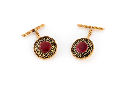  
Coppia di gemelli in oro e smalto 
 Diametro cm 1,5