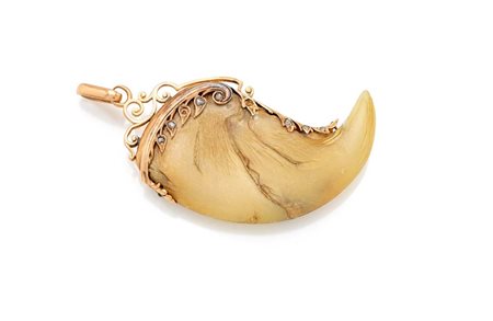  
Pendente osso in oro 
 