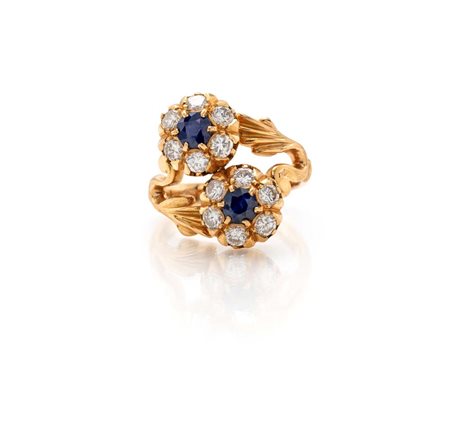  
Anello contrariè in oro, diamanti e zaffiri 
 Misura 10