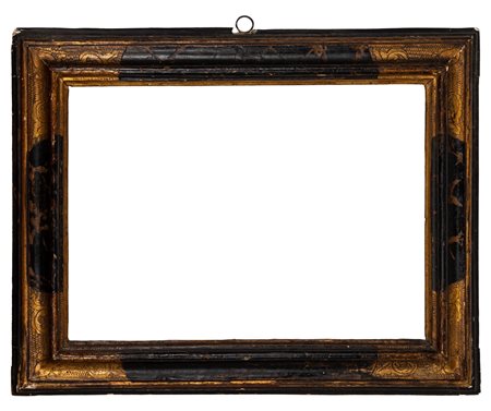 Antica cornice in legno intagliato ebanizzato e oro