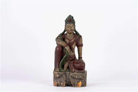 Scultura in legno policromo raffigurante Buddha seduto, secolo XX