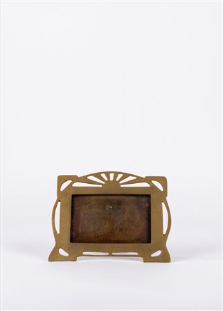 Cornice liberty in ottone