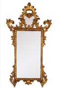 Specchiera in legno intagliato e dorato, in stile