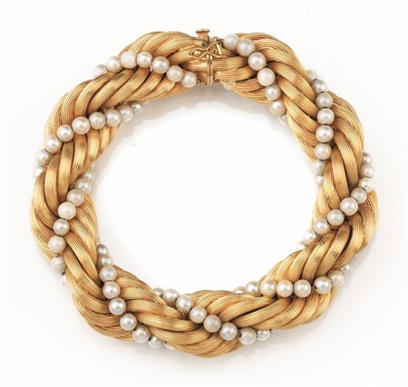 BRACCIALE IN ORO GIALLO E PERLErealizzato&nbsp; come un cerchio torchon in...