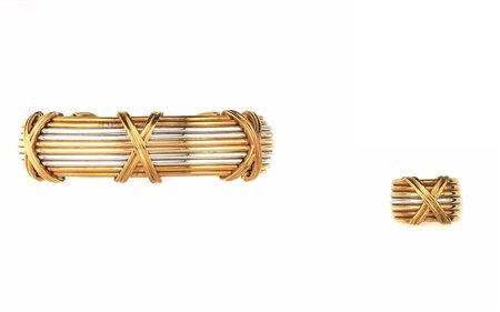 BRACCIALE E ANELLO IN ORO GIALLO, ORO ROSA E ORO BIANCOil bracciale...