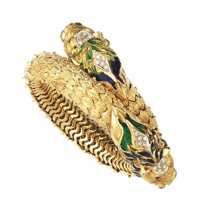 BRACCIALE IN ORO GIALLO, SMALTI, RUBINI E DIAMANTIcon montatura contrarie in...
