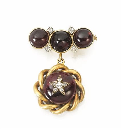 SPILLA PENDENTE IN ORO GIALLO, GRANATI E DIAMANTIrealizzata ad una linea di...