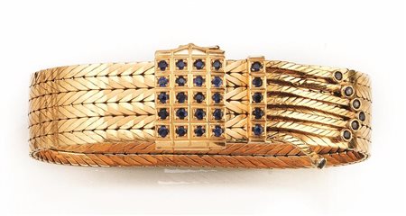 BRACCIALE IN ORO GIALLO E ZAFFIRIa nastro morbido con maglie a lisca di pesce...