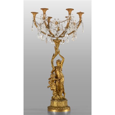 Grande candeliere in bronzo dorato, una figura 