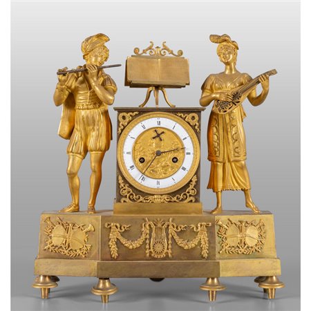 Orologio Carlo X in bronzo dorato con suonatori, 