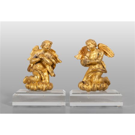 Angeli genuflessi, coppia di sculture in bronzo 
