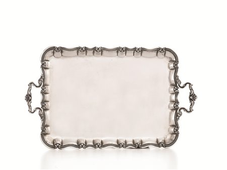 GUANTIERA, SECOLO XX&nbsp; di forma rettangolare, in argento, tesa sagomata,...