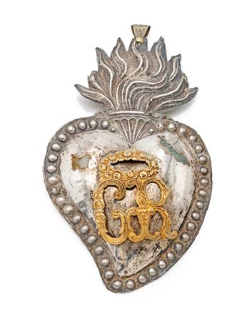  
Ex voto a cuore in lamina d'argento 
 cm 18x10,3 - gr. 15