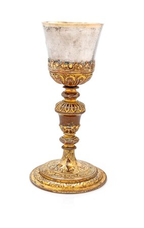  
Calice liturgico in rame dorato con coppa in argento, XVII secolo 
 cm 21,8x8,5 - coppa gr. 58