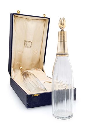  
Coppia di bottiglie in cristallo e argento, filiale spagnola della Maison Mellerio, XX secolo 
  - scatola cm 14x38x22altezza cm 33