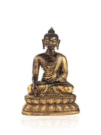 SCULTURA CINO TIBETANA SEC. XVII-XVIIIn bronzo dorato raffigurante Shakyamuni...