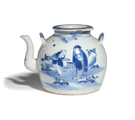  
Teiera in porcellana bianca e blu. Cina, XX secolo 
 Altezza cm 12; larghezza cm 16