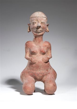  
Figura femminile antropomorfa in terracotta. Messico, Periodo preclassica/protoclassica 
 Altezza cm 40; larghezza cm 18; profondità cm 15