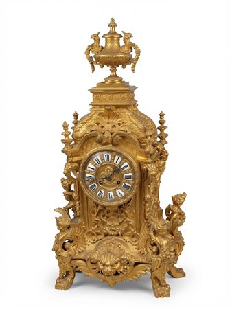 Orologio da camino monumentale in bronzo dorato con sfingi alate epoca, Dimensioni: cm 70x34.