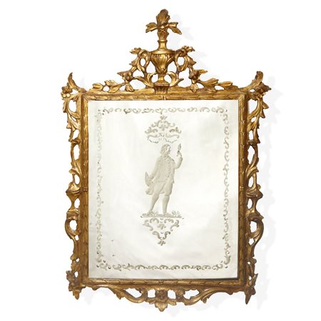 Specchiera veneziana  in cornice dorata a foglia con specchio al mercurio bulinato con personaggio carnascialesco al centro, Venice 18° century