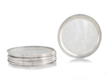 DODICI PIATTINI IN ARGENTO, XX SECOLO, circolari l