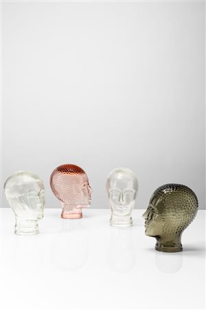 Piero Fornasetti (Milano 10/11/1913 - Milano 09/10/1988)  - Quattro teste in vetro, 1960 circa