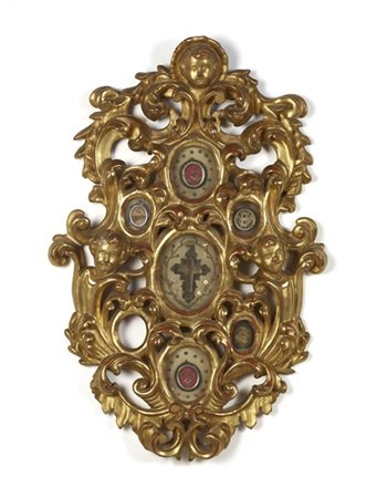 Arte del secolo XIX. Teca reliquiario in legno riccamente intagliato, traforato