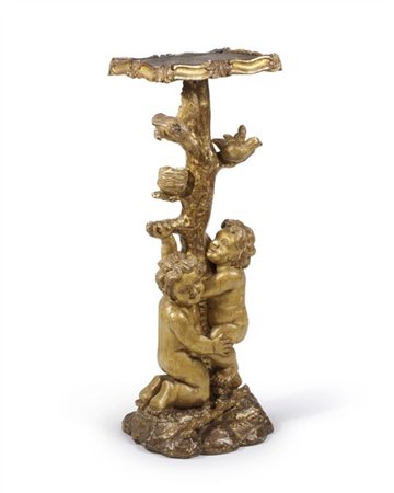 Scultore del secolo XIX. Piedistallo in legno intagliato e dorato con fusto a t