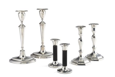 * Sei candelieri in argento di cui due con fusto tornito e base ottagonale, due
