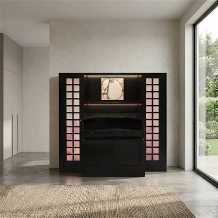 Charles Rennie Mackintosh per Cassina (Glasgow 1868 - Londra 1928)  - Credenza in frassino nero con vetro piombato con decoro floreale centrale, 1975