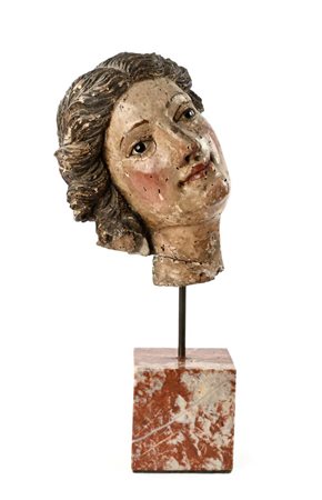 Testa di angelo in legno laccato e dorato, XVIII secolo altezza cm 30 - con...