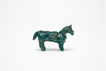 Antico cavallino persiano in ceramica invetriata turchese