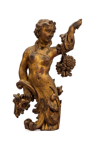 Scultura decorativa in legno intagliato e dorato raffigurante figura femminile allegorica con elementi vegetali. Secolo XIX