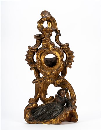 Ostensorio in legno intagliato e dorato. Secolo XIX