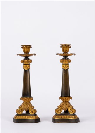 Coppia di candelieri in metallo e bronzo dorato, secolo XIX