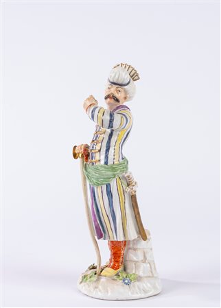 Statuetta in porcellana policroma raffigurante Persiano. Secolo XIX