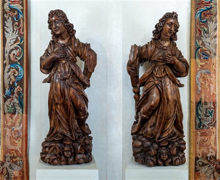 Coppia di angeli in legno scolpito. Genova, secolo XVII.