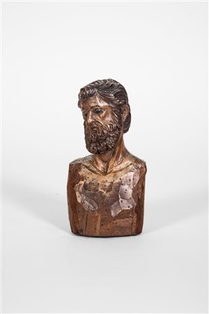 Piccolo busto maschile presepiale in legno scolpito con tracce di policromia e occhi in vetro. Italia meridionale, XVIII-XIX secolo.