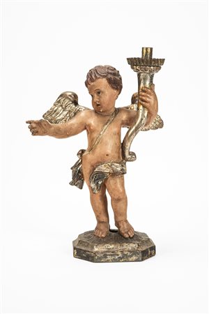 Putto reggi torcia in legno scolpito e dipinto. Secolo XIX