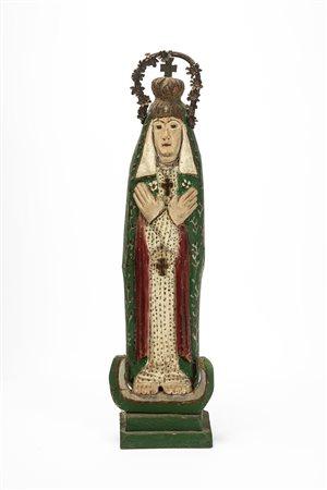 Madonna di Guadalupe in legno scolpito e policromo. Secolo XIX.