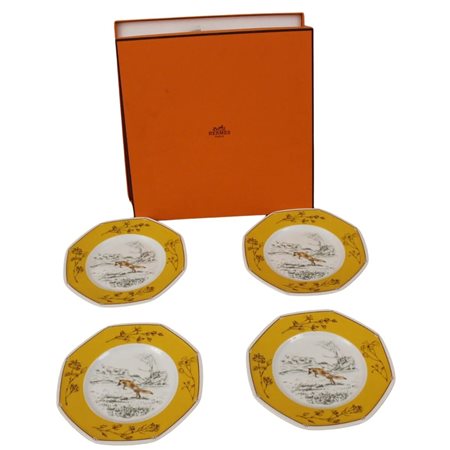 Quattro piatti ottagonali Hermès Porcellana policroma con decoro di volpe nel...